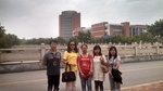 2014 Summer Picture of Jane Wu with Exchange Librarians from Shanghai Jiao Tong University Library by Courtright Memorial Library